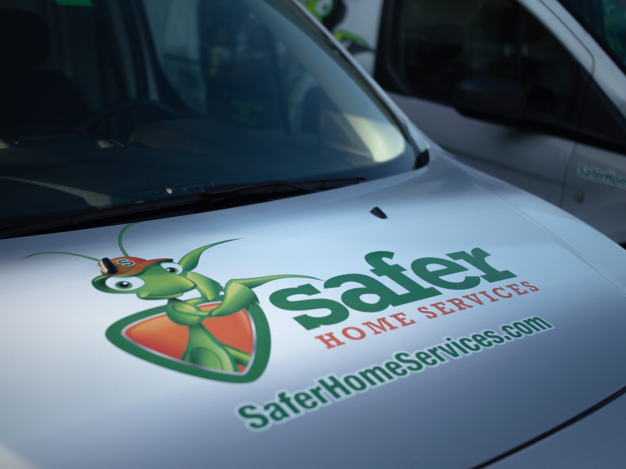 Safer Home Services Van Front logo